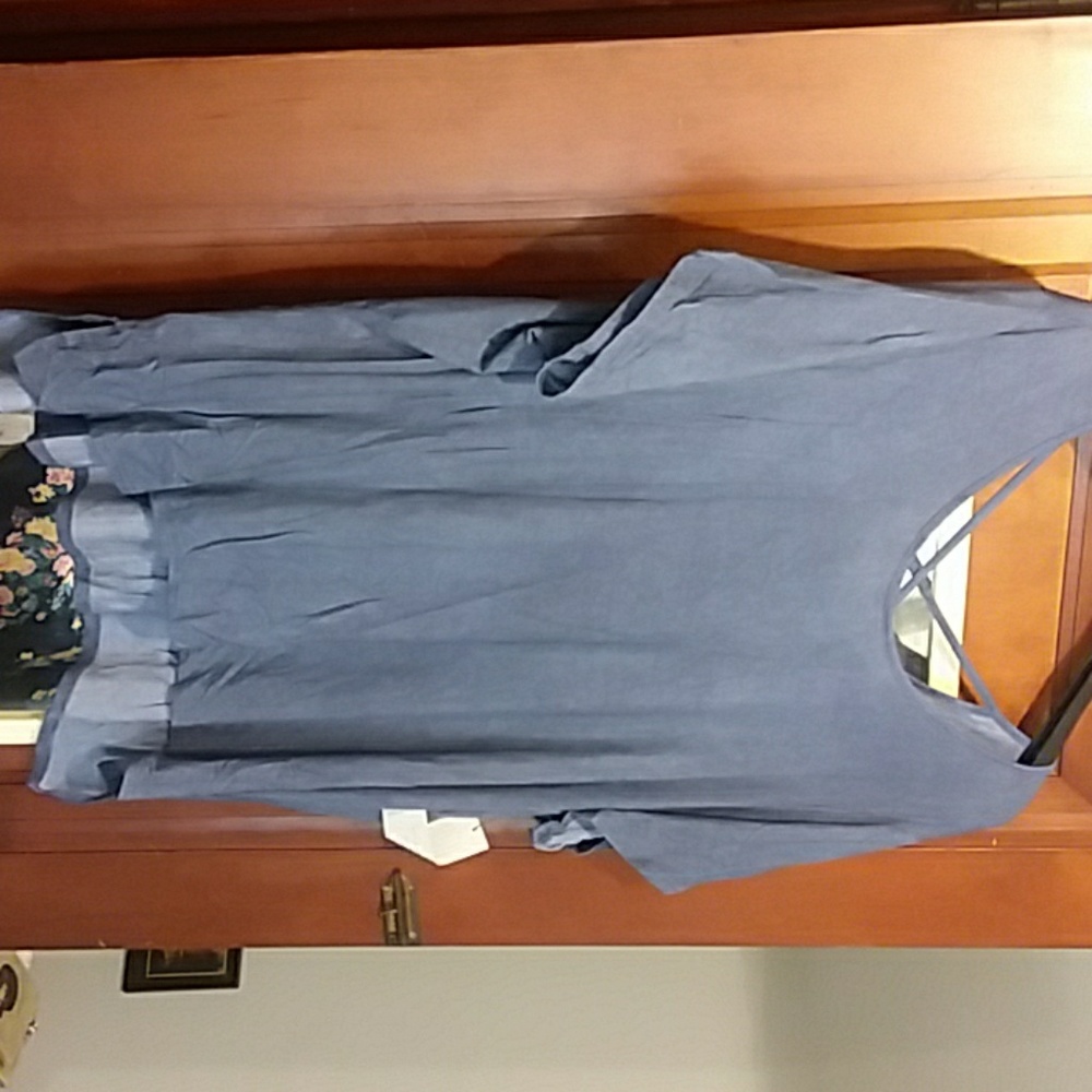 Blue top with criss cross in back